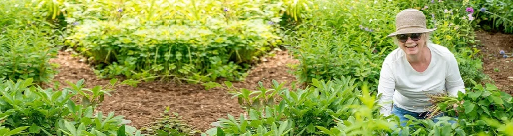 Photo of women in flower garden